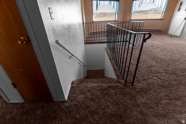 1208 East Tidwell Road Loa, UT 84747 - Photo 28 of 40 Stairway with carpet and baseboards