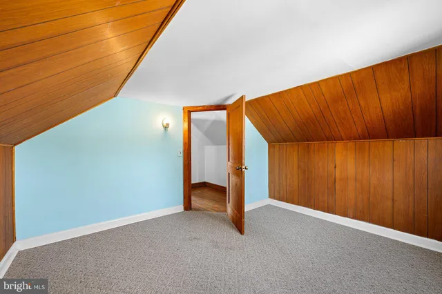 a view of an empty room and entryway