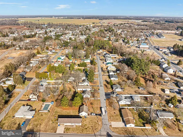 an aerial view of residential building and parking space
