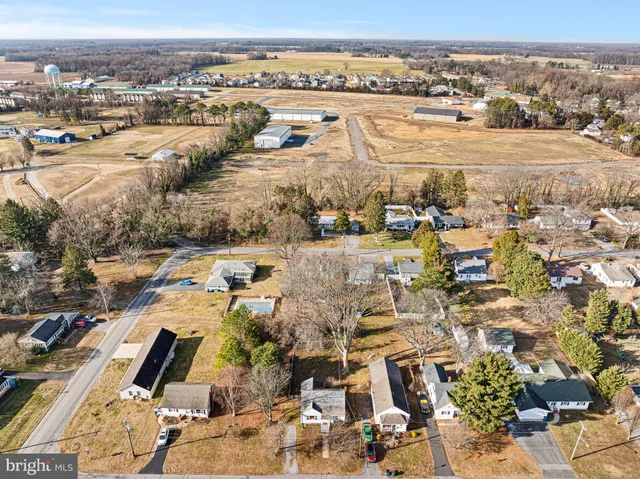 an aerial view of residential building and parking space