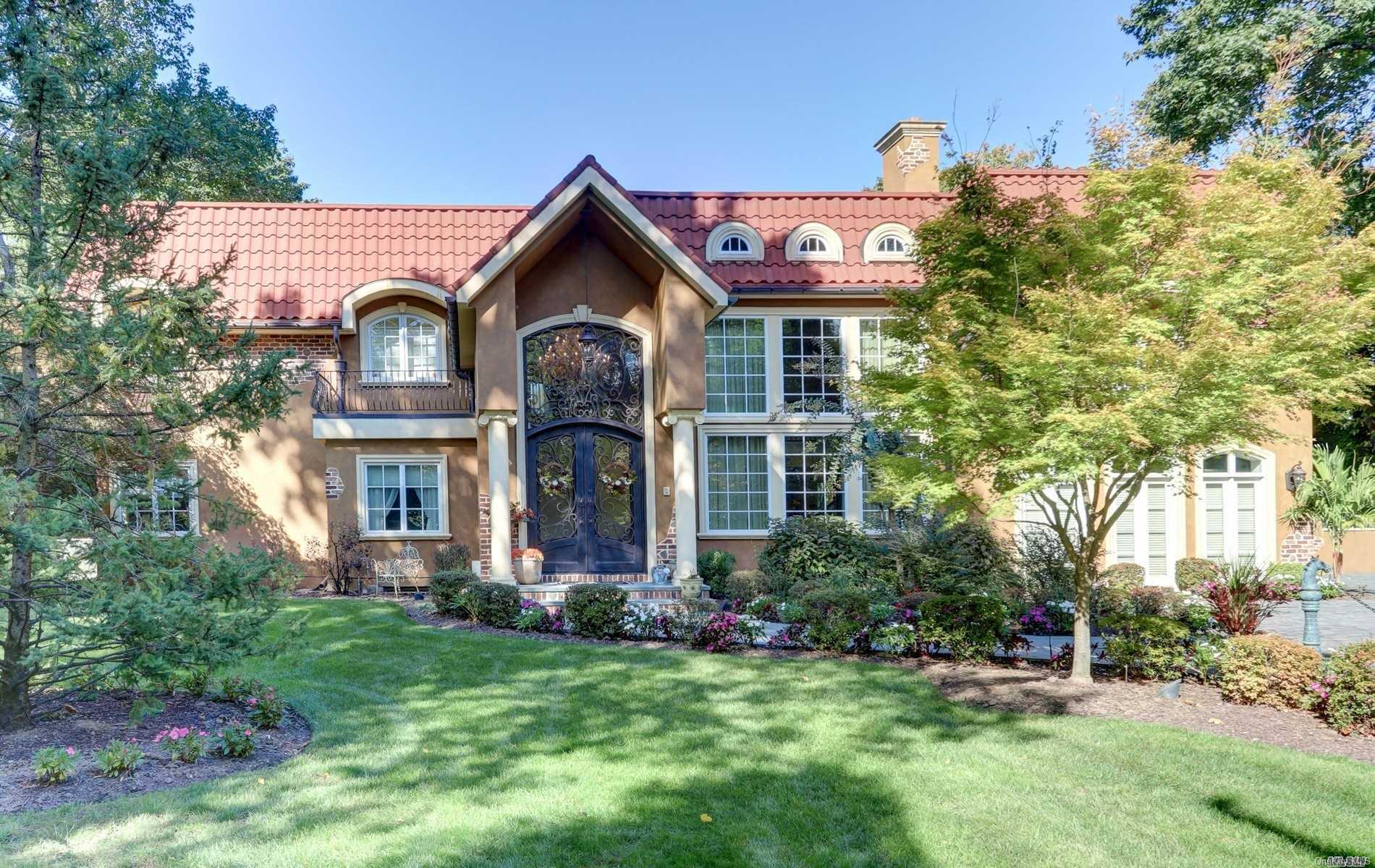 159 Bacon Road Old Westbury, NY 11568 - Photo 1 of 1 a front view of a house with garden