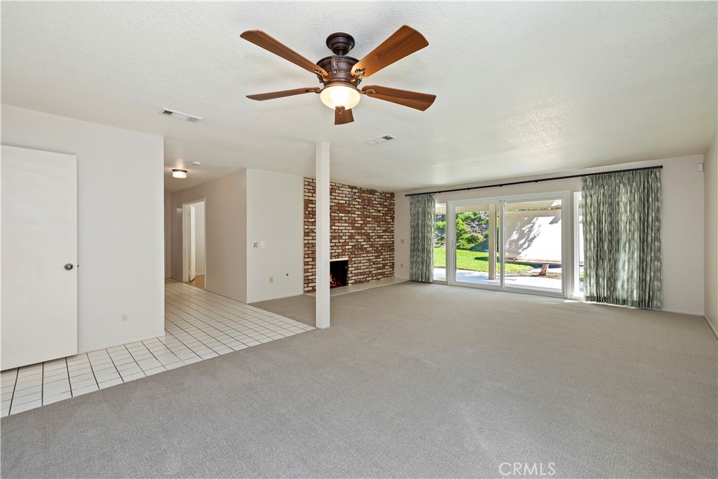 1440 Trenton Drive Riverside, CA 92506 - Photo 11 of 52 a view of a livingroom with a ceiling fan and window
