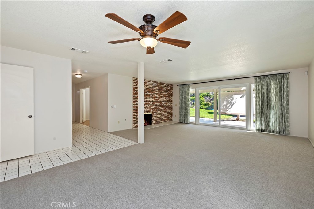 1440 Trenton Drive Riverside, CA 92506 - Photo 18 of 52 a view of a livingroom with a ceiling fan and window