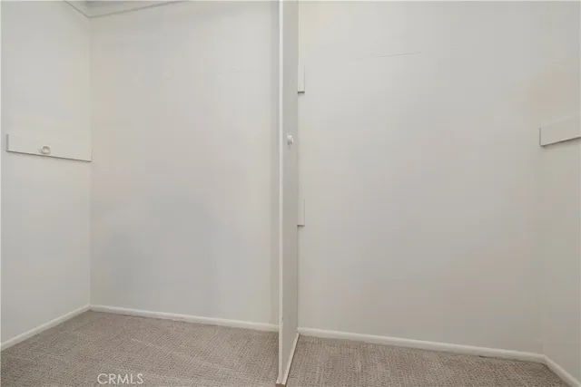 a bathroom with a sink toilet and mirror