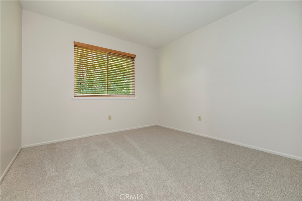 1440 Trenton Drive Riverside, CA 92506 - Photo 34 of 52 an empty room with a window