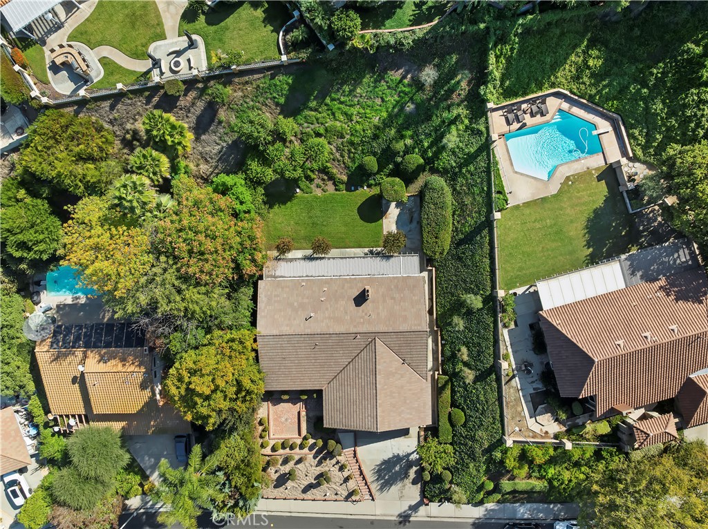 1440 Trenton Drive Riverside, CA 92506 - Photo 46 of 52 an aerial view of a house with a yard and garden