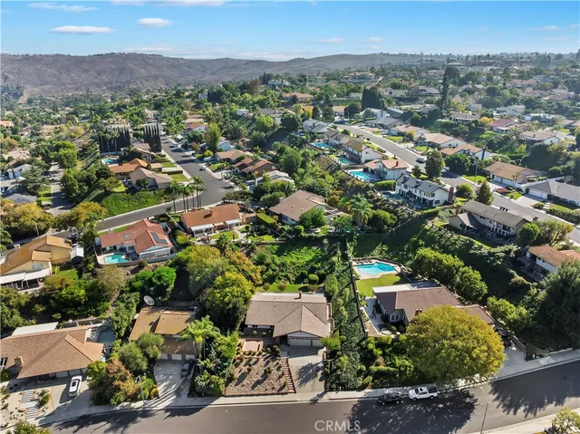 an aerial view of a city with lots of residential buildings