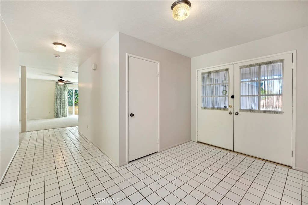 1440 Trenton Drive Riverside, CA 92506 - Photo 7 of 52 a view of a livingroom with an empty space and a window