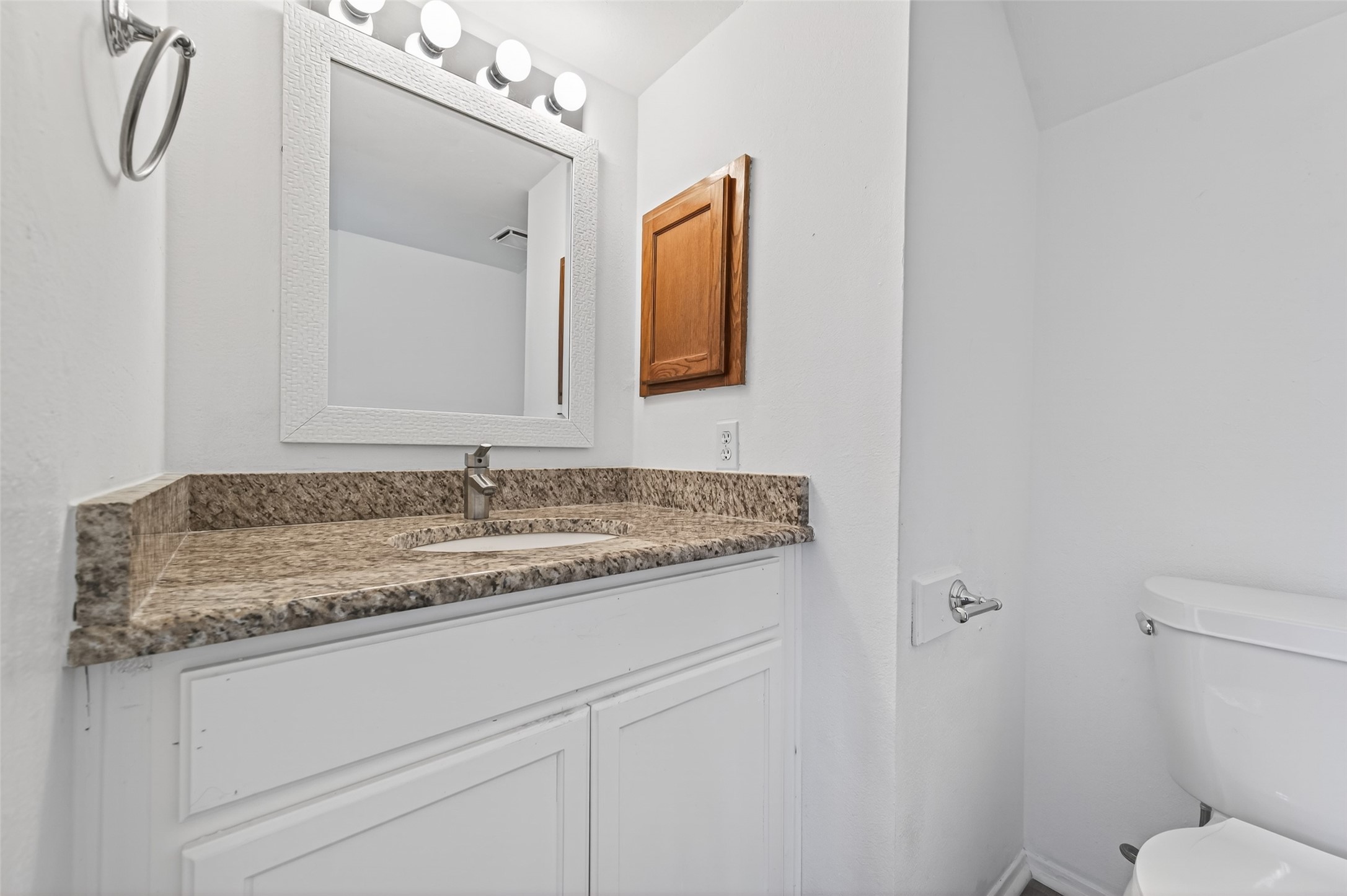11718 Inga Lane Houston, TX 77064 - Photo 11 of 24 a bathroom with a granite countertop sink and a mirror