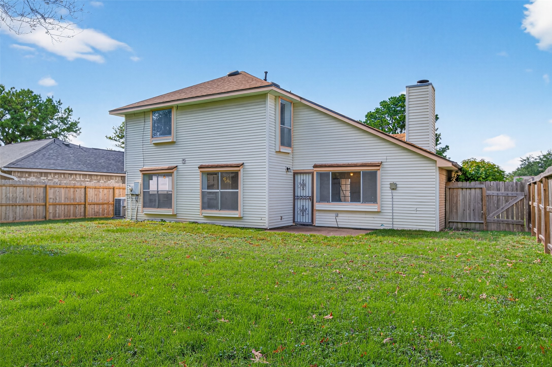11718 Inga Lane Houston, TX 77064 - Photo 22 of 24 a view of a house with a yard