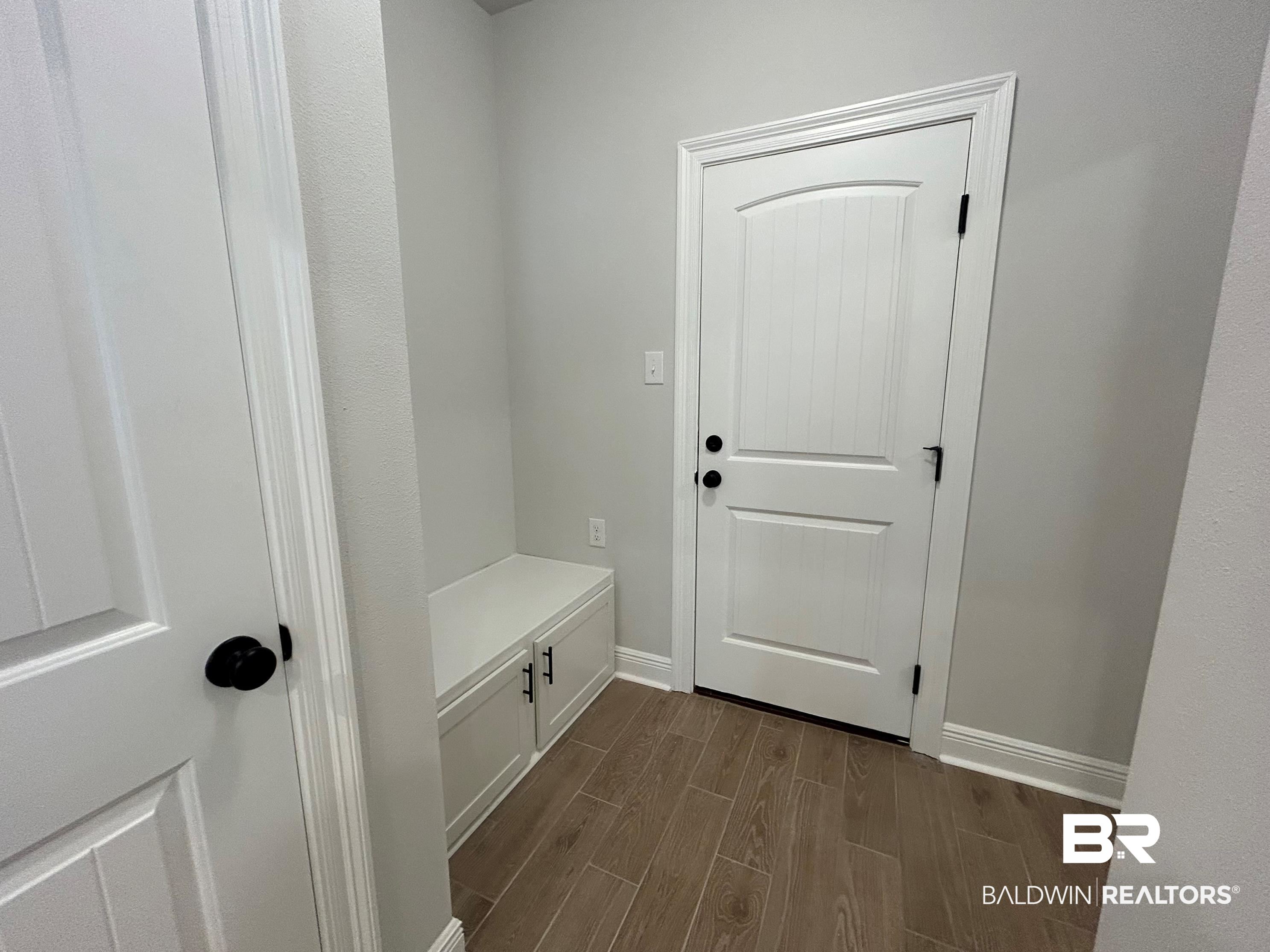 860 Sumter Loop Foley, AL 36535 - Photo 22 of 26 Mudroom with dark hardwood / wood-style floors