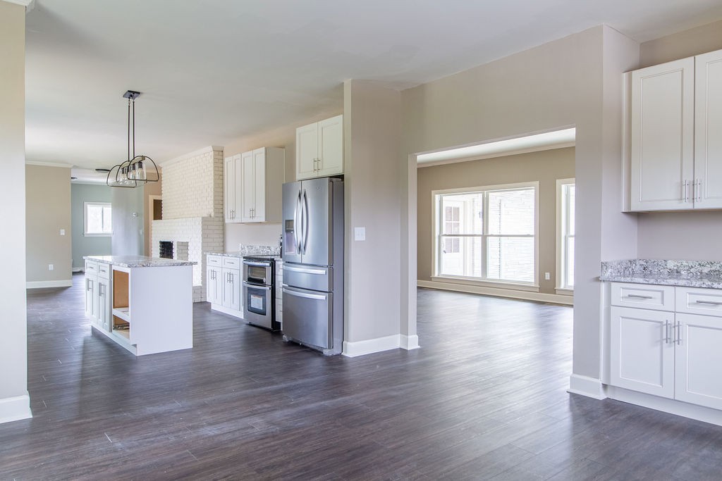 1017 Cairo Road Gallatin, TN 37066 - Photo 14 of 50 a view of kitchen with cabinets and wooden floor