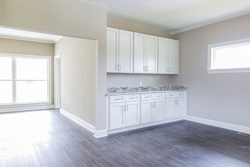 1017 Cairo Road Gallatin, TN 37066 - Photo 15 of 50 a room with wooden floors and white cabinets