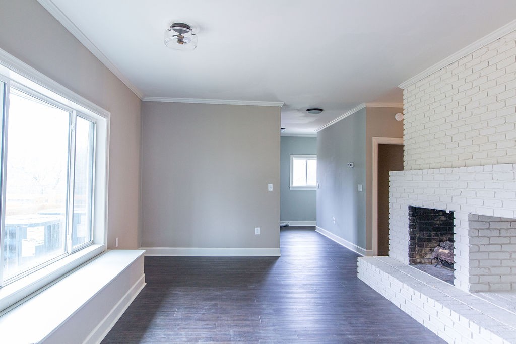 1017 Cairo Road Gallatin, TN 37066 - Photo 18 of 50 a view of an empty room with wooden floor and a window