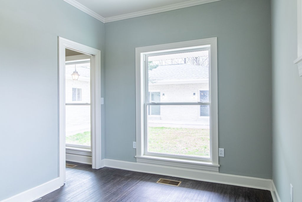1017 Cairo Road Gallatin, TN 37066 - Photo 21 of 50 a view of an empty room with wooden floor and a window
