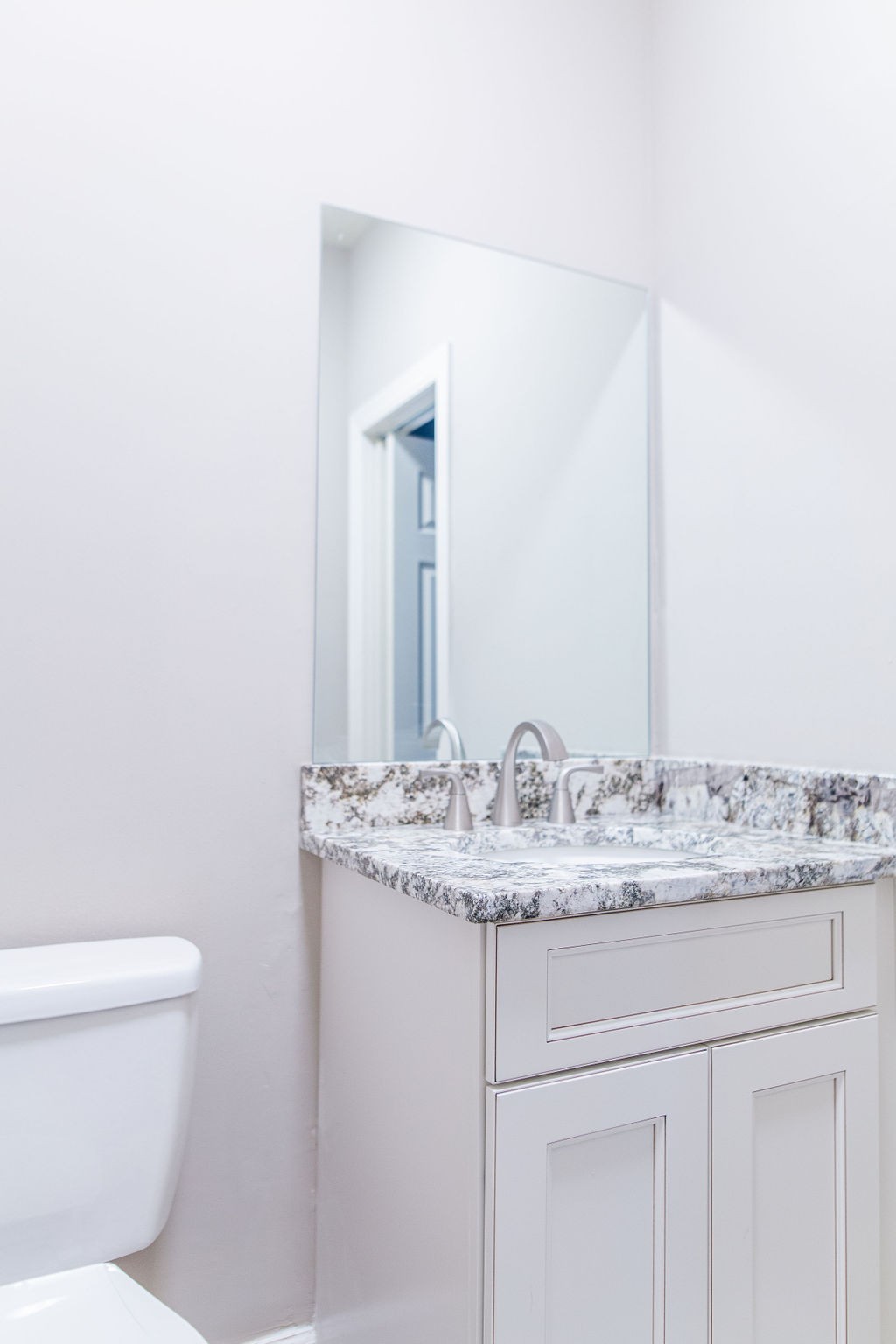 1017 Cairo Road Gallatin, TN 37066 - Photo 25 of 50 a bathroom with a granite countertop sink and a mirror