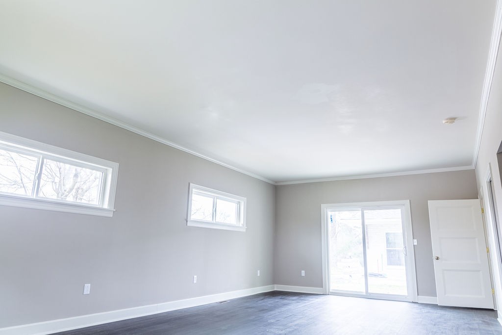 1017 Cairo Road Gallatin, TN 37066 - Photo 31 of 50 an empty room with wooden floor and windows