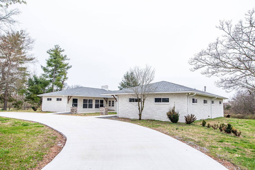1017 Cairo Road Gallatin, TN 37066 - Photo 40 of 50 a front view of a house with a garden