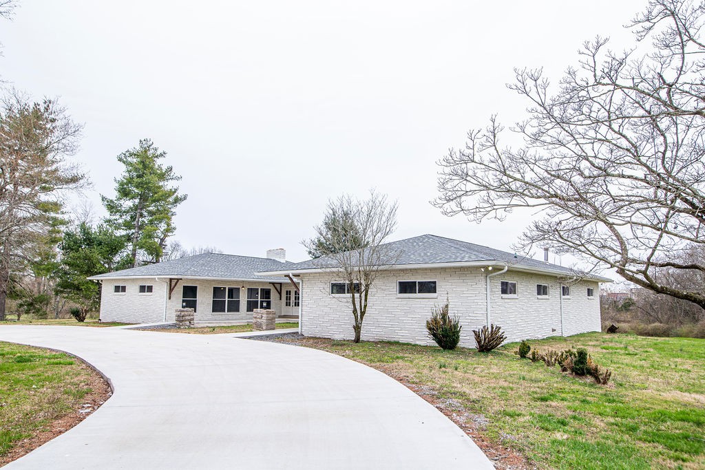 1017 Cairo Road Gallatin, TN 37066 - Photo 41 of 50 a front view of a house with a yard