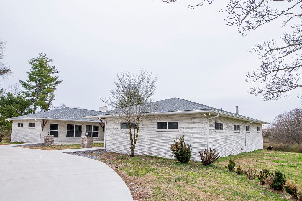 1017 Cairo Road Gallatin, TN 37066 - Photo 44 of 50 a front view of a house with a yard