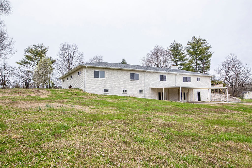 1017 Cairo Road Gallatin, TN 37066 - Photo 46 of 50 a front view of house with yard and trees in the background