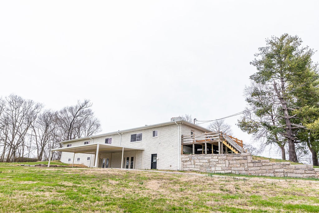 1017 Cairo Road Gallatin, TN 37066 - Photo 48 of 50 a front view of a house with a garden