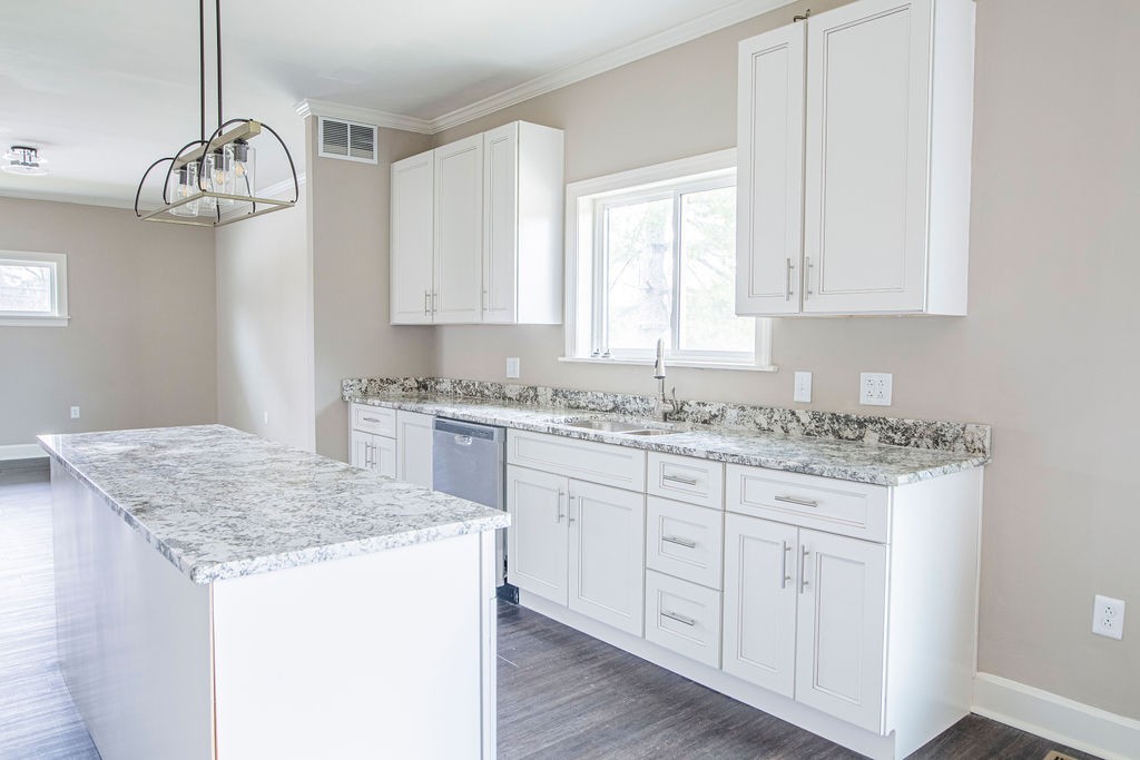 1017 Cairo Road Gallatin, TN 37066 - Photo 9 of 50 a kitchen with granite countertop white cabinets and a dishwasher