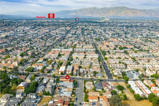 an aerial view of residential building and parking space