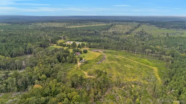 a view of a yard with an outdoor space