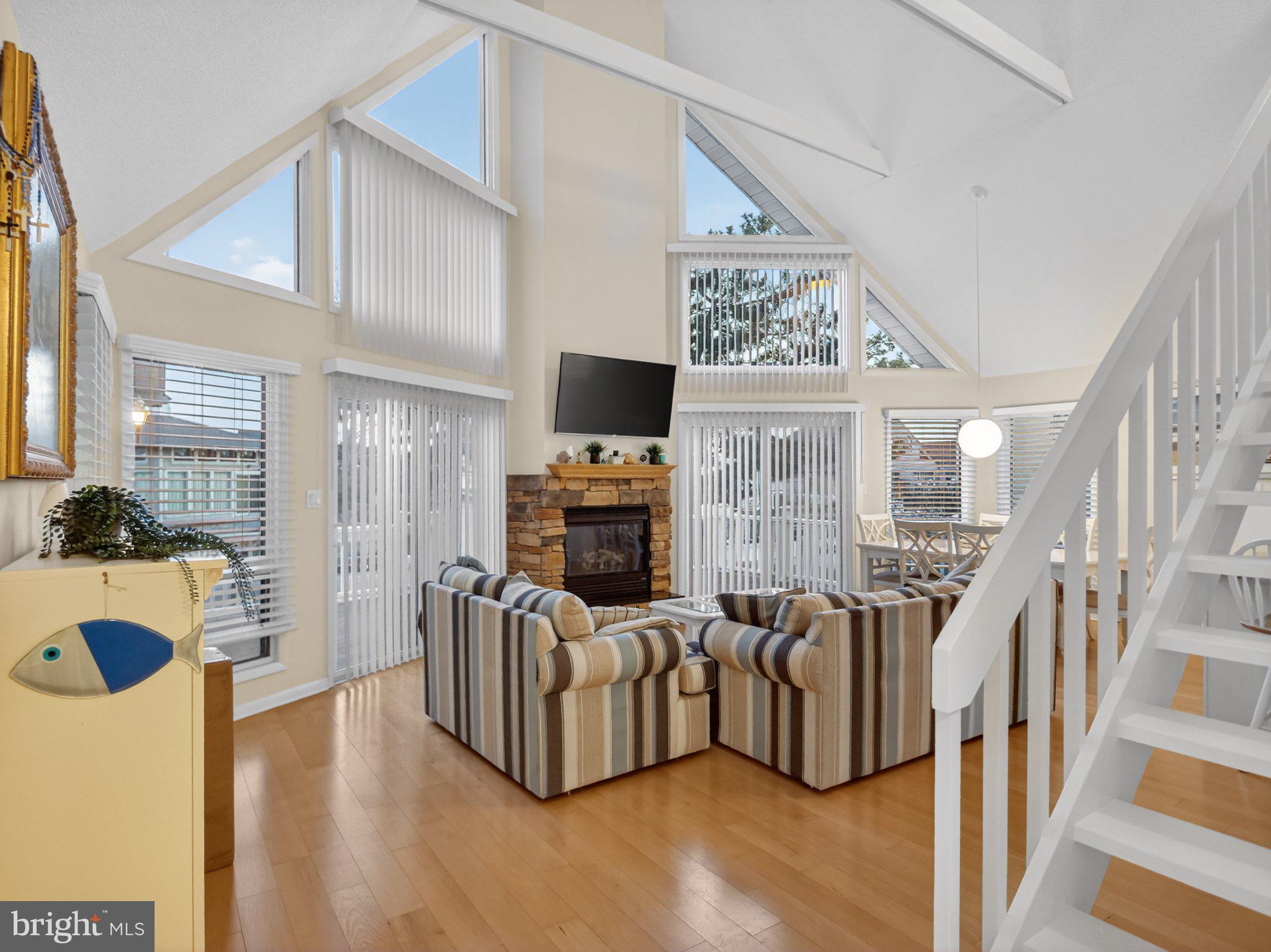 103 Channel Buoy Road Ocean City, MD 21842 - Photo 13 of 29 Bright and airy living space awaits.