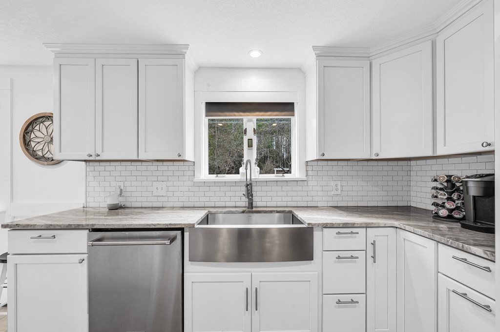 45 Scantic Road Hampden, MA 01036 - Photo 12 of 37 a kitchen with sink cabinets and window