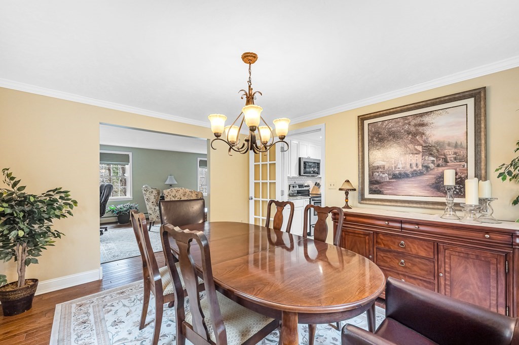 45 Scantic Road Hampden, MA 01036 - Photo 15 of 37 a dining room with furniture a chandelier and window