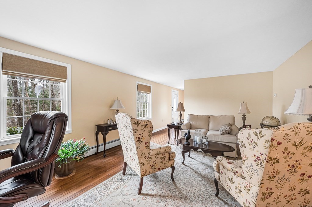 45 Scantic Road Hampden, MA 01036 - Photo 16 of 37 a living room with furniture rug and a window