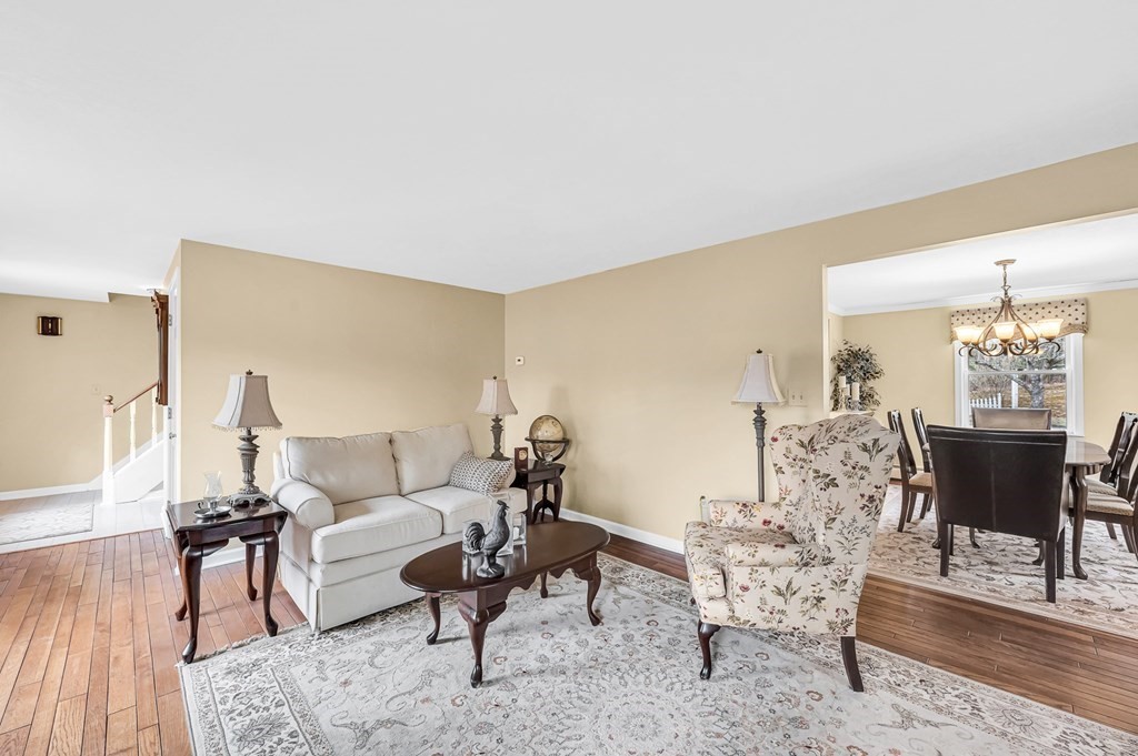 45 Scantic Road Hampden, MA 01036 - Photo 17 of 37 a living room with furniture wooden floor and a table