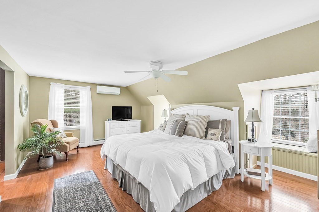 45 Scantic Road Hampden, MA 01036 - Photo 21 of 37 a bedroom with double bed and a potted plant