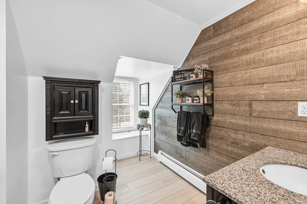 45 Scantic Road Hampden, MA 01036 - Photo 27 of 37 a bathroom with a toilet a sink and mirror