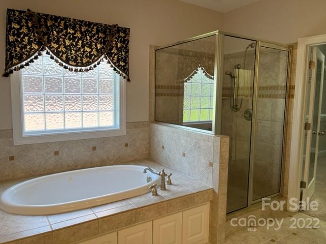 119 Blakemore Drive Shelby, NC 28152 - Photo 17 of 23 a bathroom with a tub and a shower