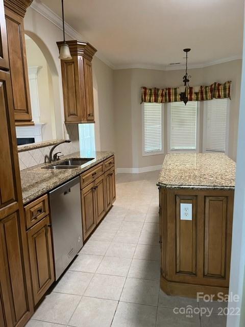 119 Blakemore Drive Shelby, NC 28152 - Photo 10 of 23 a kitchen with stainless steel appliances granite countertop a sink stove and cabinets