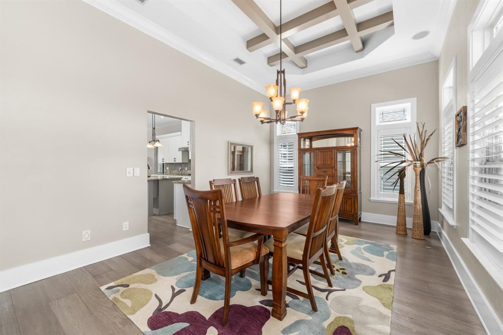 1751 Southwest 188th Street Newberry, FL 32669 - Photo 12 of 93 a view of a dining room with furniture and wooden floor