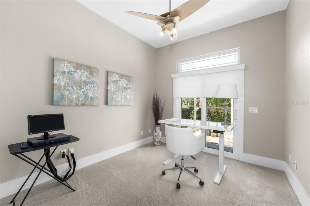 1751 Southwest 188th Street Newberry, FL 32669 - Photo 28 of 93 a view of a workspace with furniture and a window