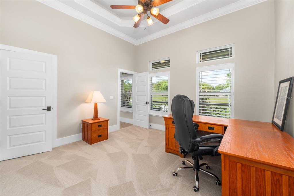 1751 Southwest 188th Street Newberry, FL 32669 - Photo 47 of 93 a view of a workspace with furniture and a window