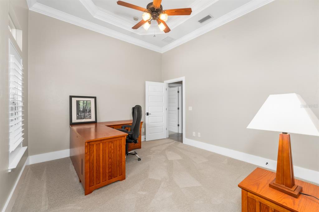 1751 Southwest 188th Street Newberry, FL 32669 - Photo 48 of 93 a view of a workspace with furniture and a window