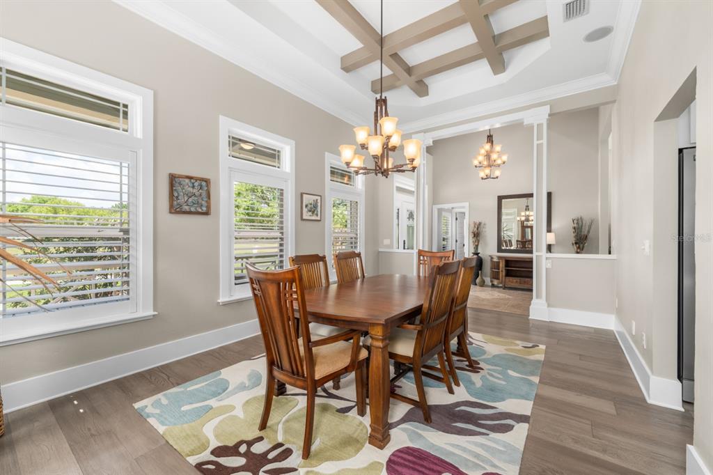 1751 Southwest 188th Street Newberry, FL 32669 - Photo 6 of 93 a view of a dining room with furniture and wooden floor