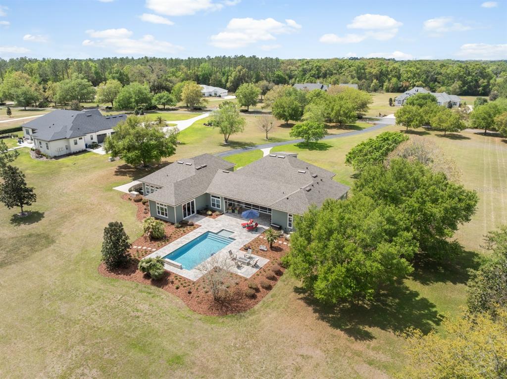 1751 Southwest 188th Street Newberry, FL 32669 - Photo 77 of 93 an aerial view of residential houses with outdoor space and river