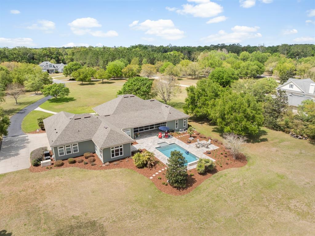 1751 Southwest 188th Street Newberry, FL 32669 - Photo 78 of 93 an aerial view of a house with yard swimming pool and outdoor seating