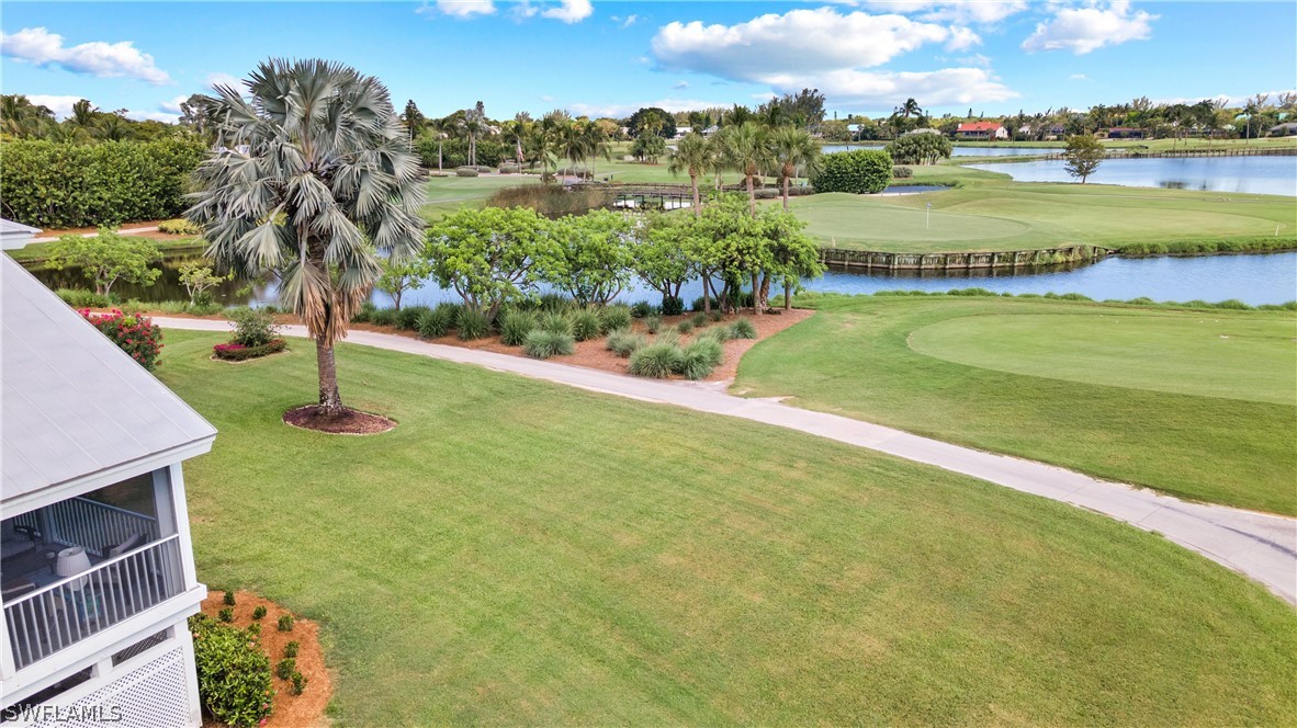 1649 Sand Castle Road Sanibel, FL 33957 - Photo 26 of 34 a view of a lake with a big yard