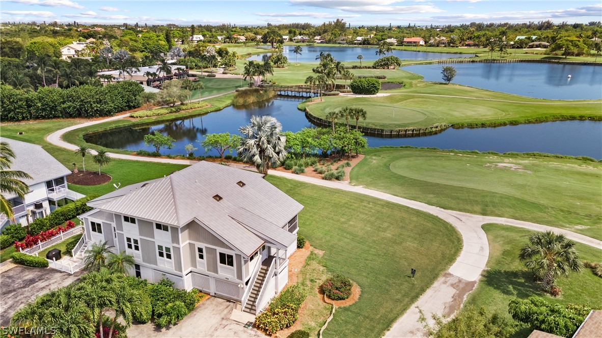 1649 Sand Castle Road Sanibel, FL 33957 - Photo 27 of 34 an aerial view of a house with a swimming pool yard and outdoor seating
