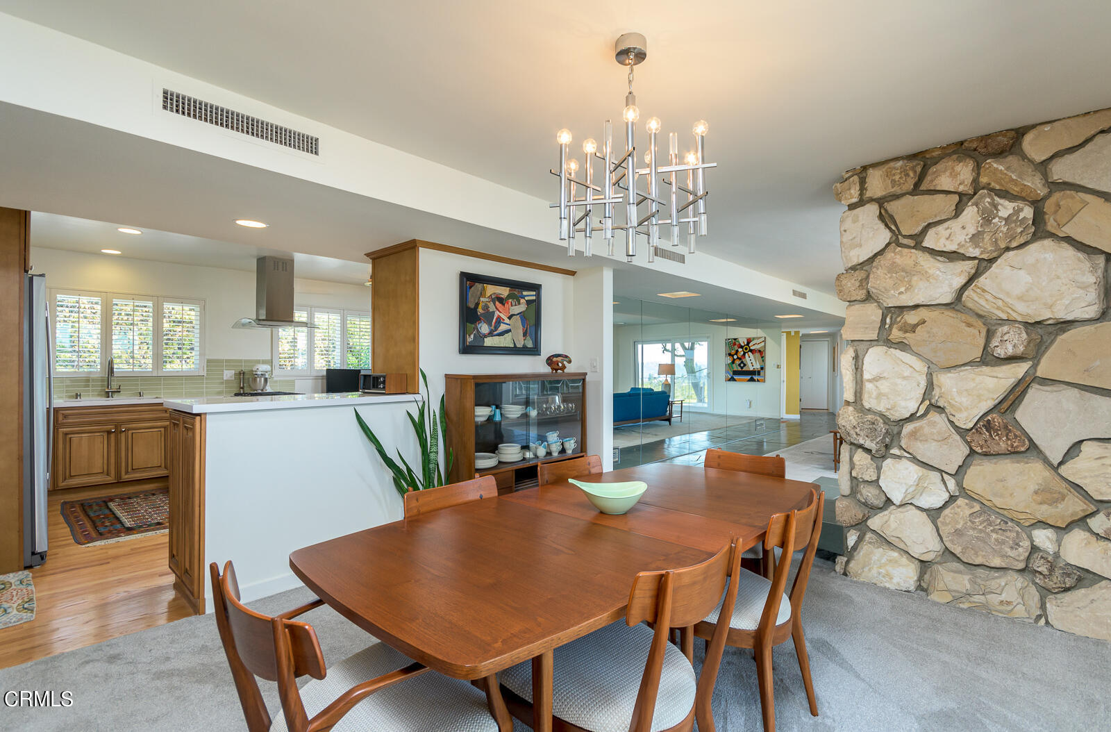 667 Glen Avenue Glendale, CA 91206 - Photo 12 of 46 a view of a dining room with furniture and a chandelier