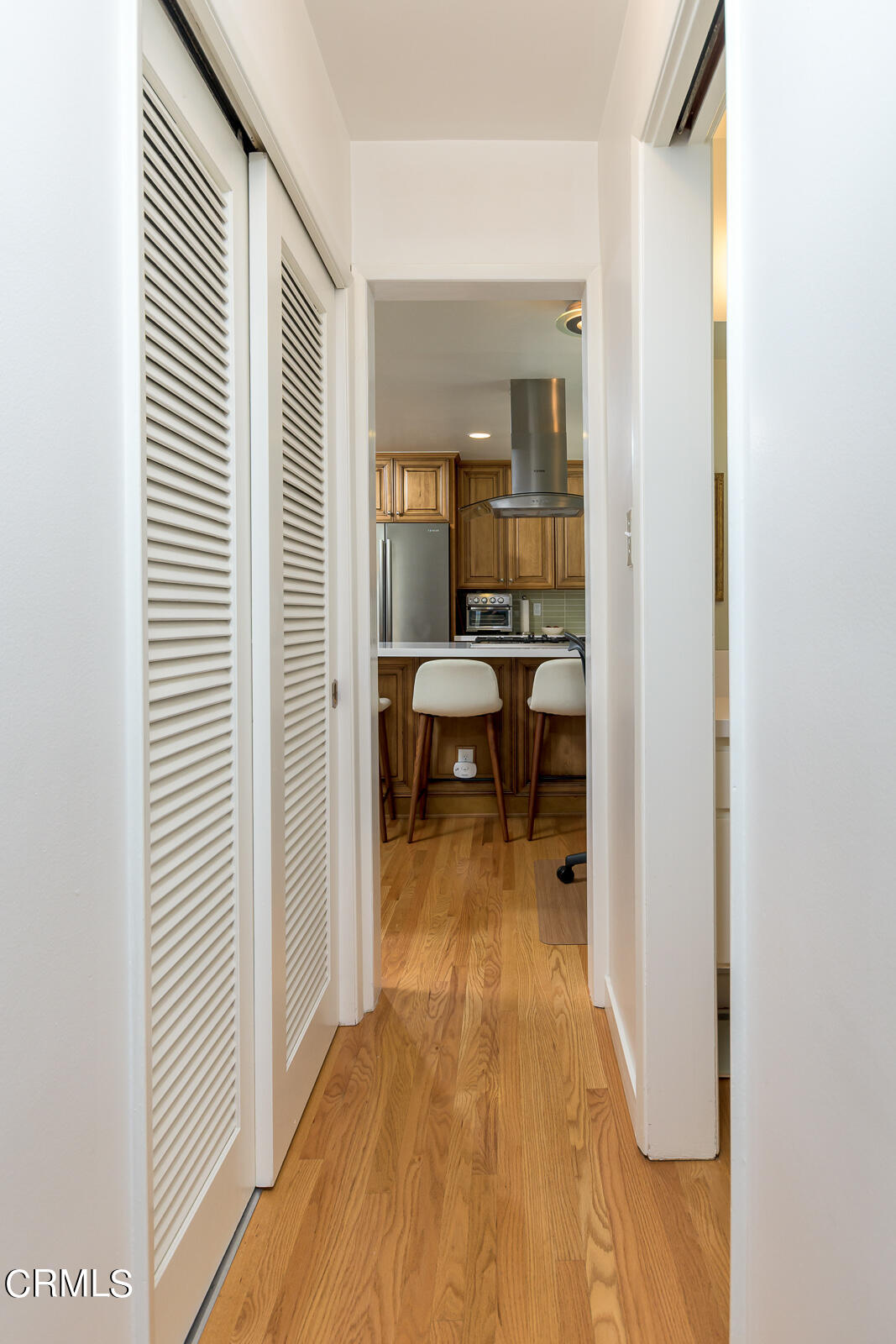 667 Glen Avenue Glendale, CA 91206 - Photo 16 of 46 a view of a bedroom with a bed and wooden floor