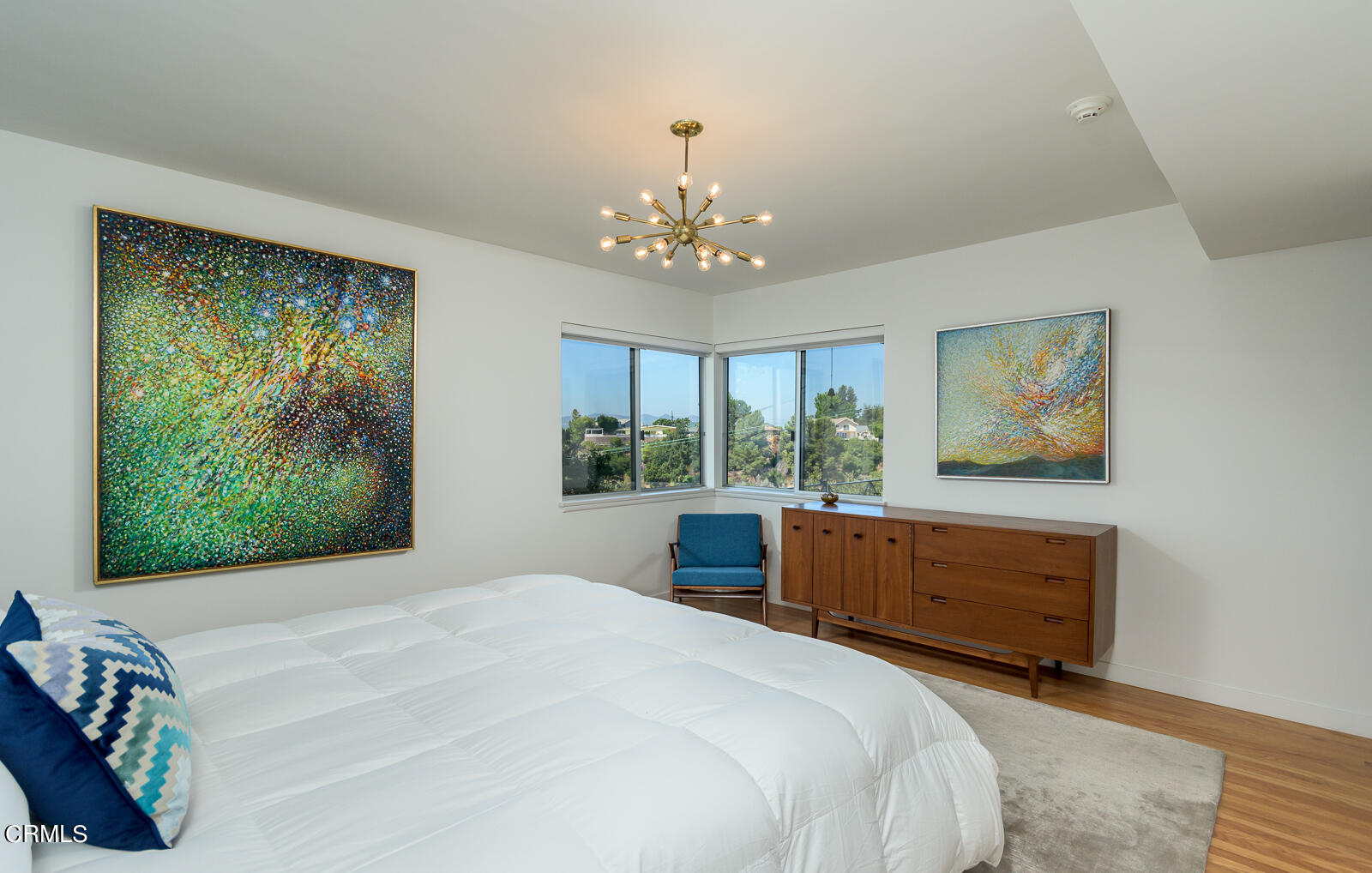 667 Glen Avenue Glendale, CA 91206 - Photo 21 of 46 a bedroom with a bed and a window